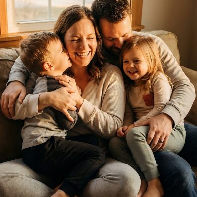 family, love, child, kid, parent, couch, home, happy, together, mother, father, son, daughter, hug, embrace, affection, tenderness, childhood, parenthood, domestic, lifestyle, relationship, bonding, ai generated